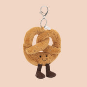 A pretzel shaped bag charm