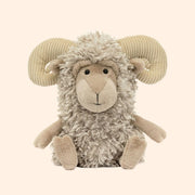 A ram sheep shaped stuffed animal.