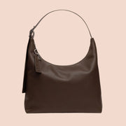 A brown leather shoulder handbag.