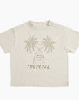 A neutral t-shirt with a palm tree graphic on the front and text in between that reads, "Only Sunny Days Tropical".