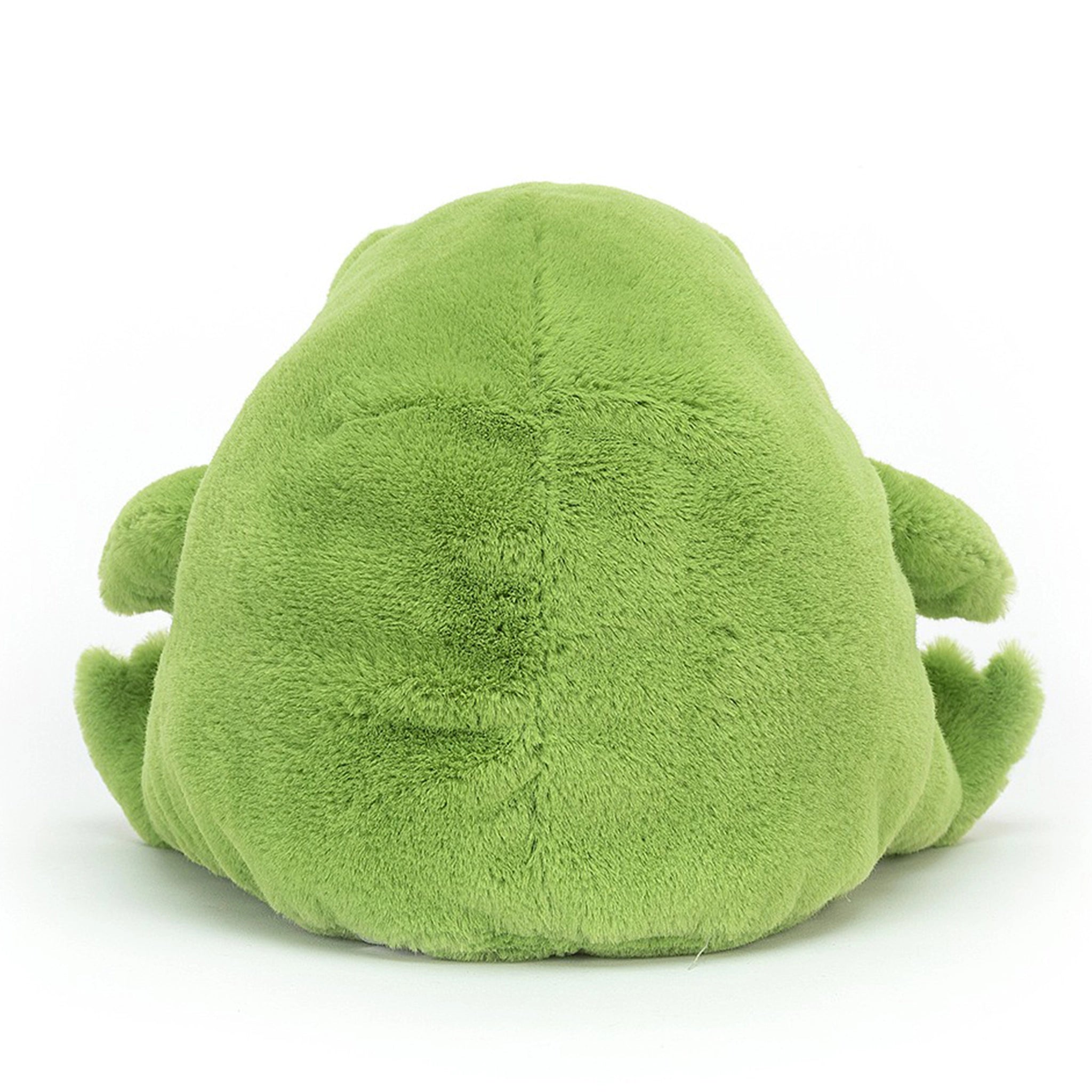 On a white background is a green frog stuffed animal with with a frown face.