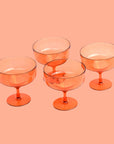 A set of four coupe glass margarita tumblers.
