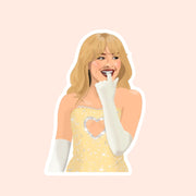 A sticker of an illustrated Sabrina Carpenter in her yellow heart cutout concert outfit.