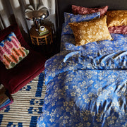 A blue and white floral print duvet / quilt cover.