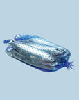 A blue net of chocolates wrapped in silver foil to look like sardine fish.