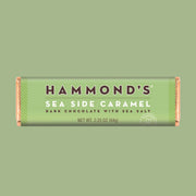 A green bar of chocolate with text that reads, "Hammond's Sea Side Caramel Dark Chocolate With Sea Salt'.