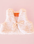 A sherpa vest for a doll.