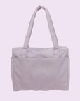 A light pink puffer tote bag.