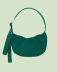 A green nylon shoulder / crossbody handbag with an adjustable strap.