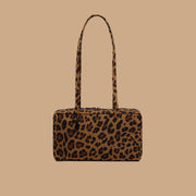 A nylon leopard print shoulder bag.