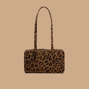 A nylon leopard print shoulder bag.
