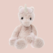 A light pink unicorn shaped stuffed toy.