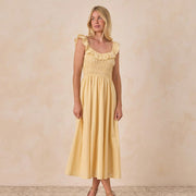 A yellow dress with a ruffle tank sleeve and neckline.
