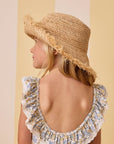 A neutral straw bucket hat for kids.