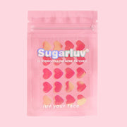 Heart shaped hydrocolloid acne patches.