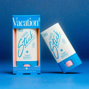 A blue and white stick sunscreen with text on the packaging that reads, 'Super Stick SPF 45 Vacation'.