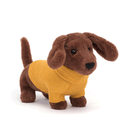 On a white background is a brown dacschund stuffed animal with a yellow sweater. 
