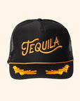 A black mesh back snapback trucker hat with gold embroidered text that reads, "Tequila".