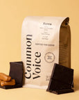 A bag of coffee in a neutral package with black text that reads, "Common Voice".