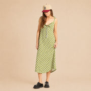 A green and cream checkered tie dress.