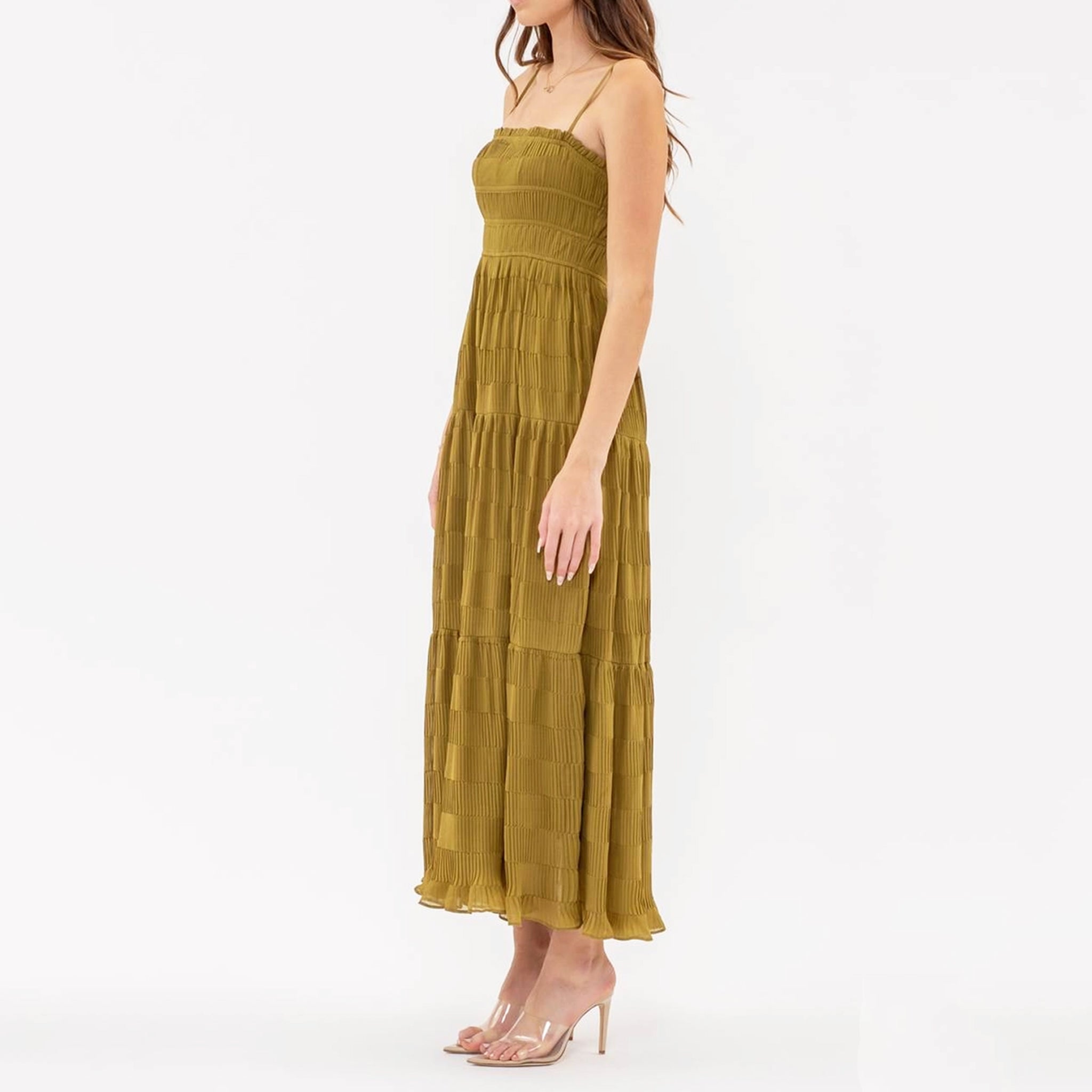 An olive green tiered midi dress with spaghetti straps.