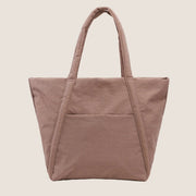 A taupe nylon tote bag.