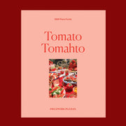 A light pink box filled with a tomato themed puzzle with beautiful red hues and imagery.