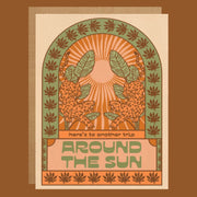 Decorative card with leopards, sun, and leaf patterns on a brown background