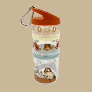 A stackable container for small snacks that stacks on top of one another with western designs like horseshoes, horses, cowboy boots and hats.