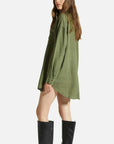 A green linen shirtdress button up with long sleeves.
