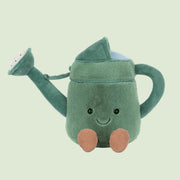 A green watering can shaped stuffed toy with a smiling face.