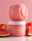 On a pink background is a jar of pink sugar scrub with white text that reads, "Hey, Sugar Exfoliating All Natural Body Scrub".