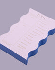 A wavy shaped notepad with text that reads, 'TODAY Morning Mood:'.