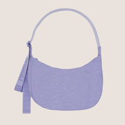 A periwinkle nylon shoulder / crossbody handbag with an adjustable strap.