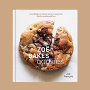 A neutral book cover with a photo of a chocolate chip cookie and text that reads, 'Zoë Bakes Cookies'.