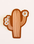 A salmon pink cactus sticker with cactus flowers on each arm.