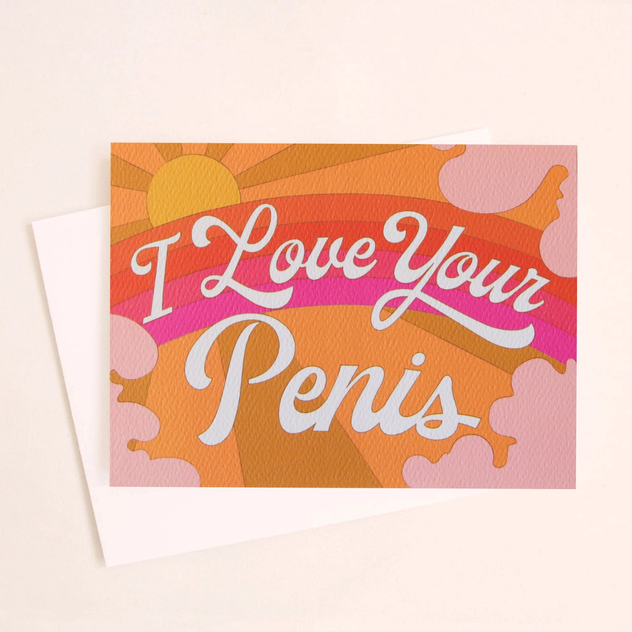 On a white background is a card with a rainbow sky illustration with text across the front that reads, &quot;I Love Your Penis&quot;.
