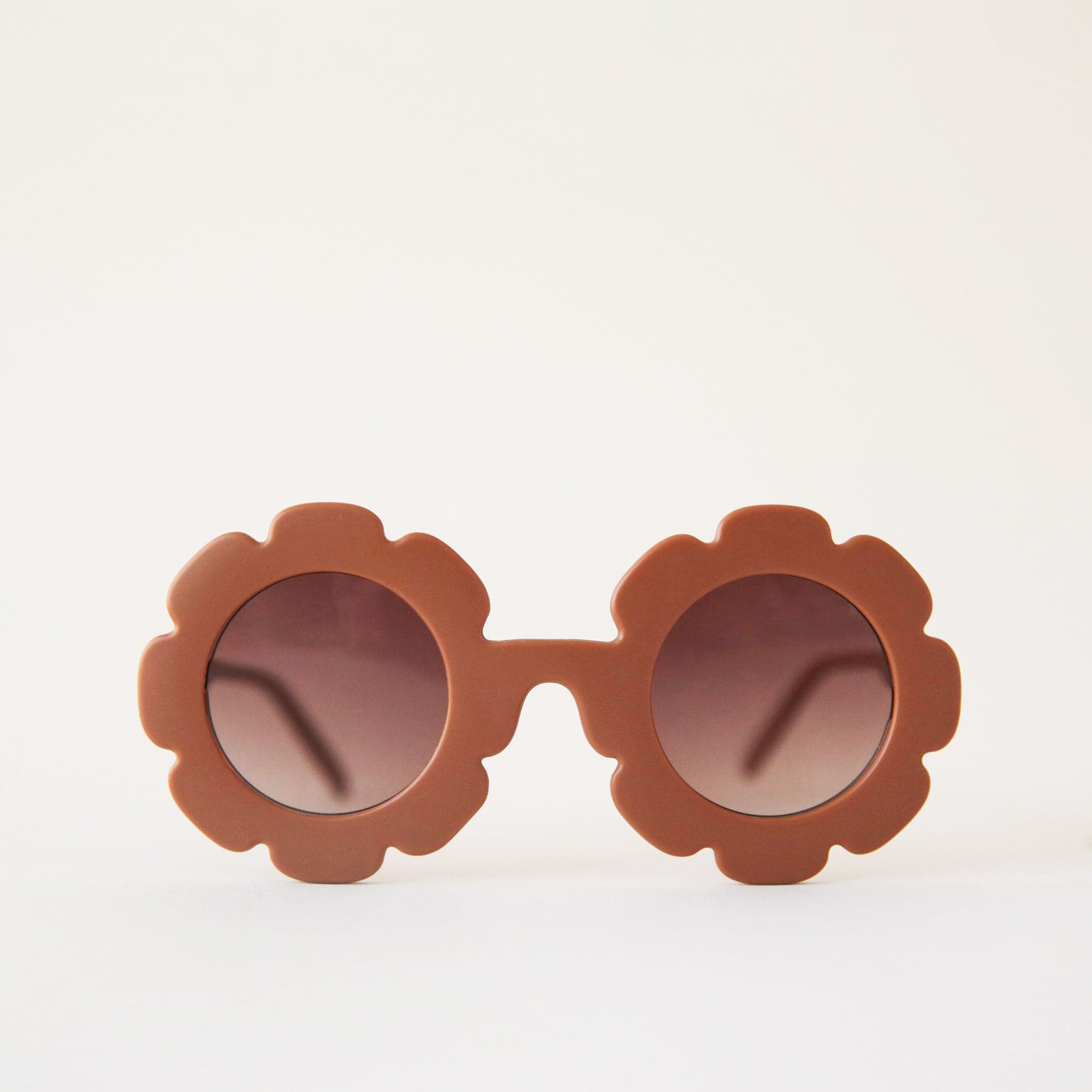 Cognac colored flower shaped sunnies for the little ones.