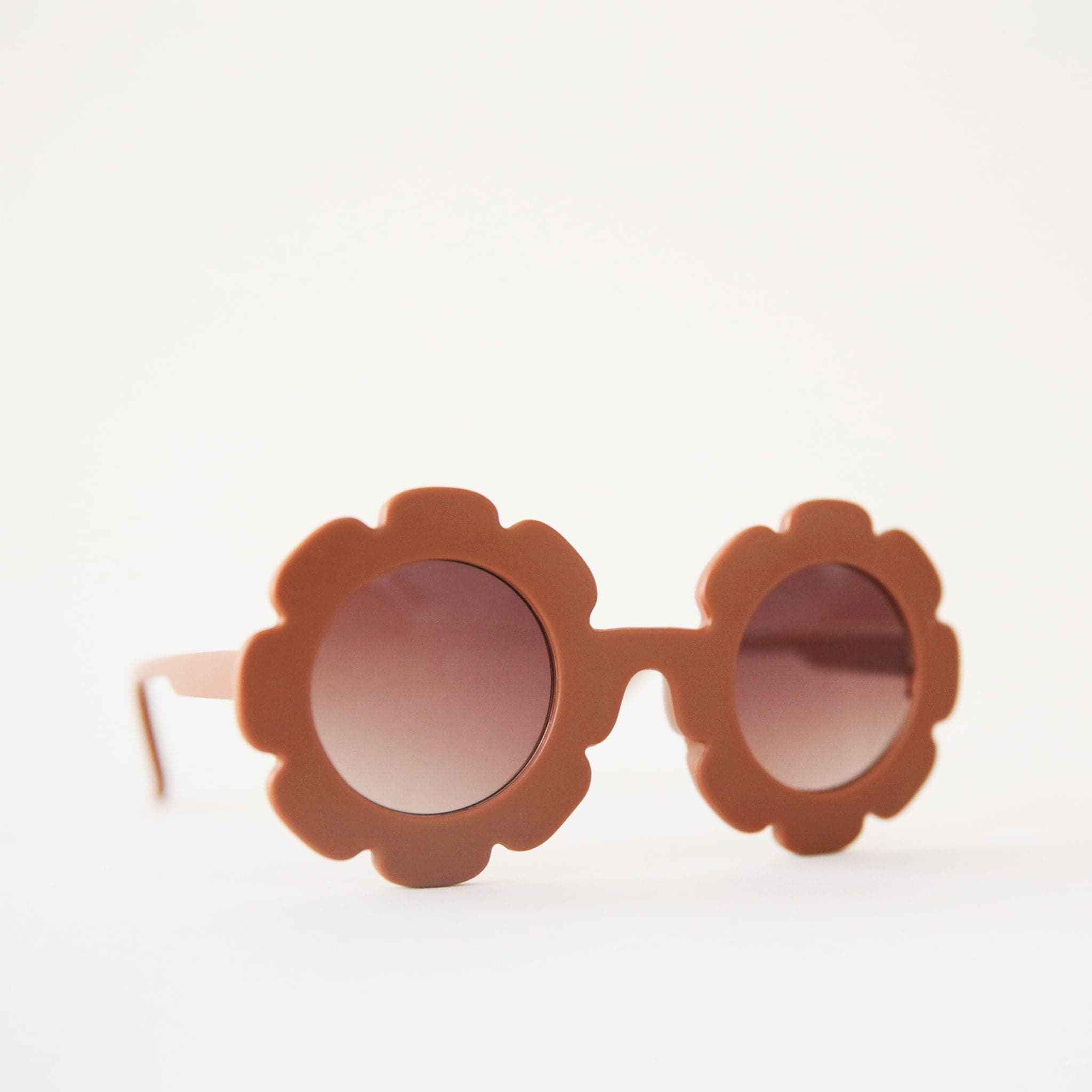 Cognac colored flower shaped sunnies for the little ones.