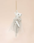 A white felt unicorn ornament with a grey tulle dress.