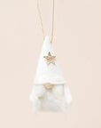 A plush white gnome ornament with a gold star and pigtail beard on a neutral ground.