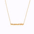 Photo of a gold necklace on a white background. Necklace reads "mamacita" in gold lowercase script. Chain is linked to either side of the word at the top-most point and the chain is leading upwards off the page in a "v" shape.  