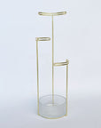 Tesora is designed with three posts of varying heights to accommodate jewelry of any length. At the base of the tree is a dish, which allows for additional storage of smaller accessories, like earrings and brooches. The stand’s unique double wire detailing on each post makes for a secure display of earrings or cufflinks.