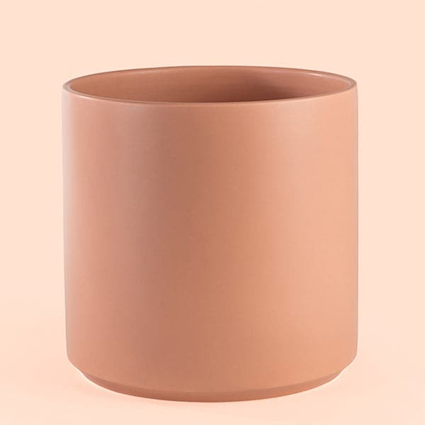 This 5 gallon ceramic pot has a classic cylinder shape and is a peachy color. 