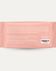 A pink bag of wet wipes with a resealable dispenser at the top along with words one the side that read, "Good for your dog. Good for the planet." in white text.