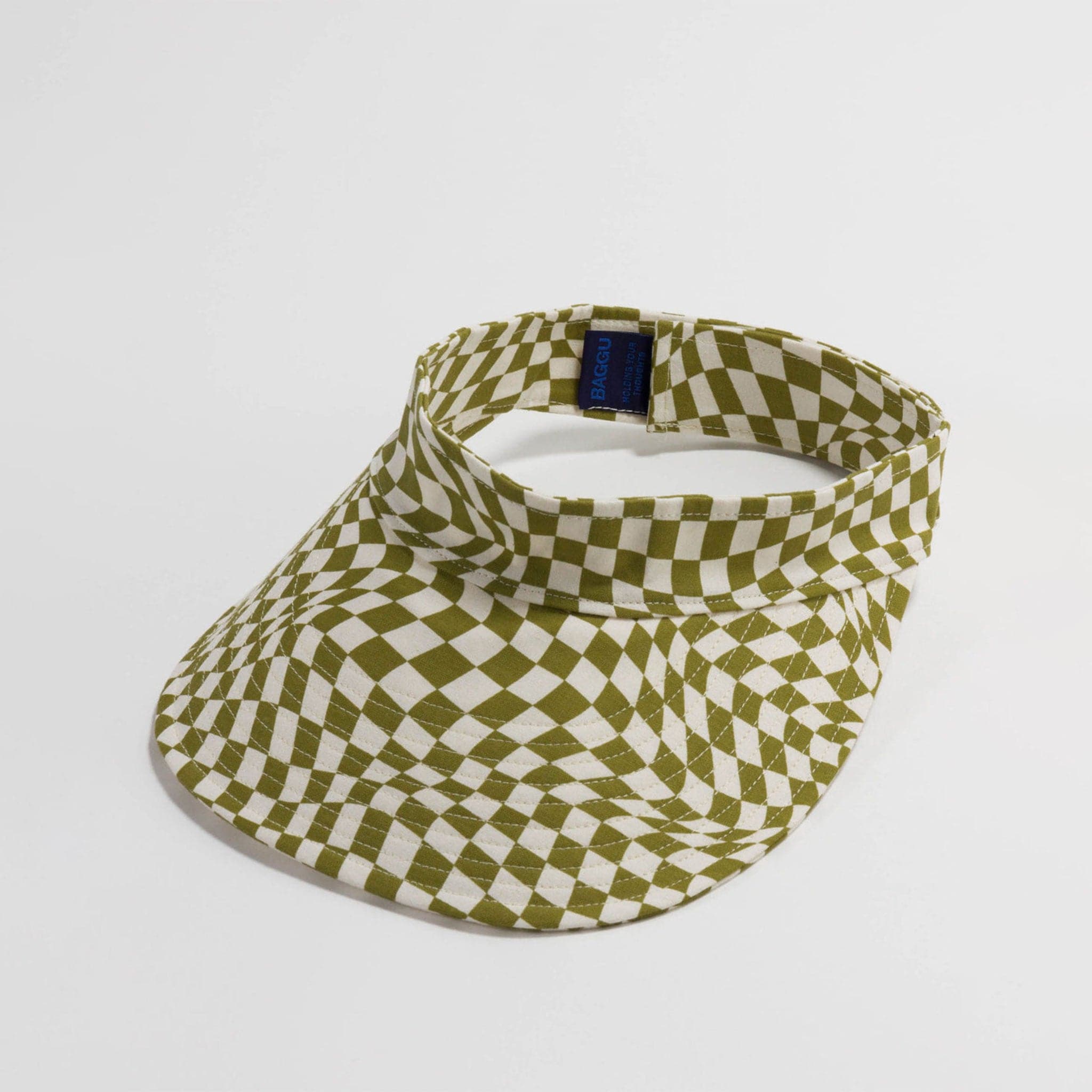 A visor with green and white wavy checkers.