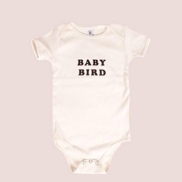 White baby onesie with black lettering on chest, &quot;Baby Bird&quot;