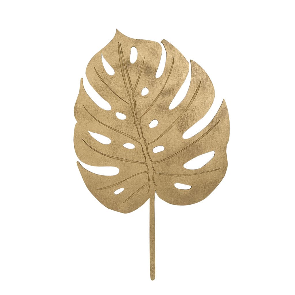 A wooden Monstera Leaf cut out.
