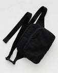 A black nylon fanny pack with two zipper pockets and a black adjustable strap.