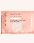 The pink packet that the lip mask comes in featuring black text that reads, "Flashpatch Hydrating Lip Gels".